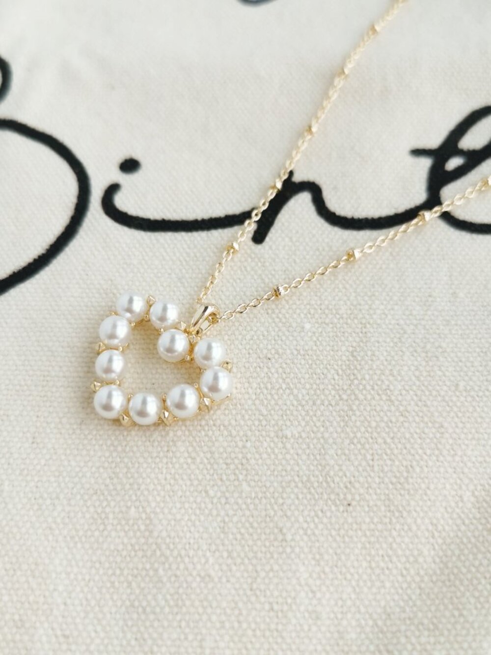 Kendra Scott Gold Heart Necklace with Pearly White Beads - Picture 3 of 3